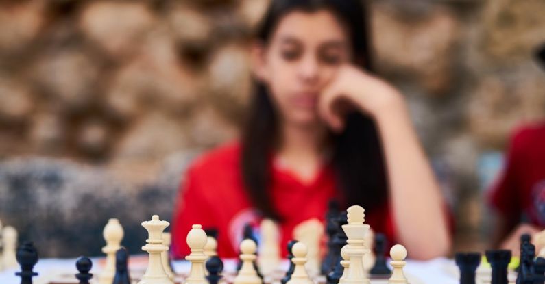 Decision - Woman Playing Chess